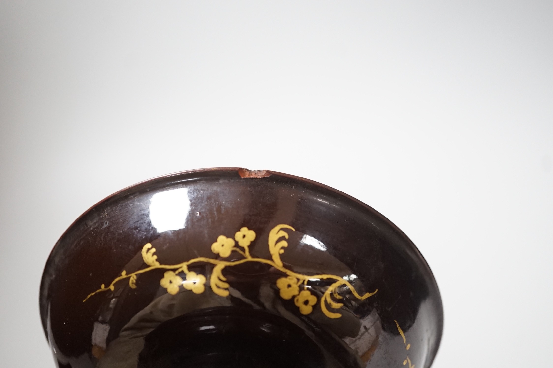 A Bayreuth glazed and gilded footed dish, c.1730-40, in imitation of Böttger stoneware, 11.2cm diameter, foot glued